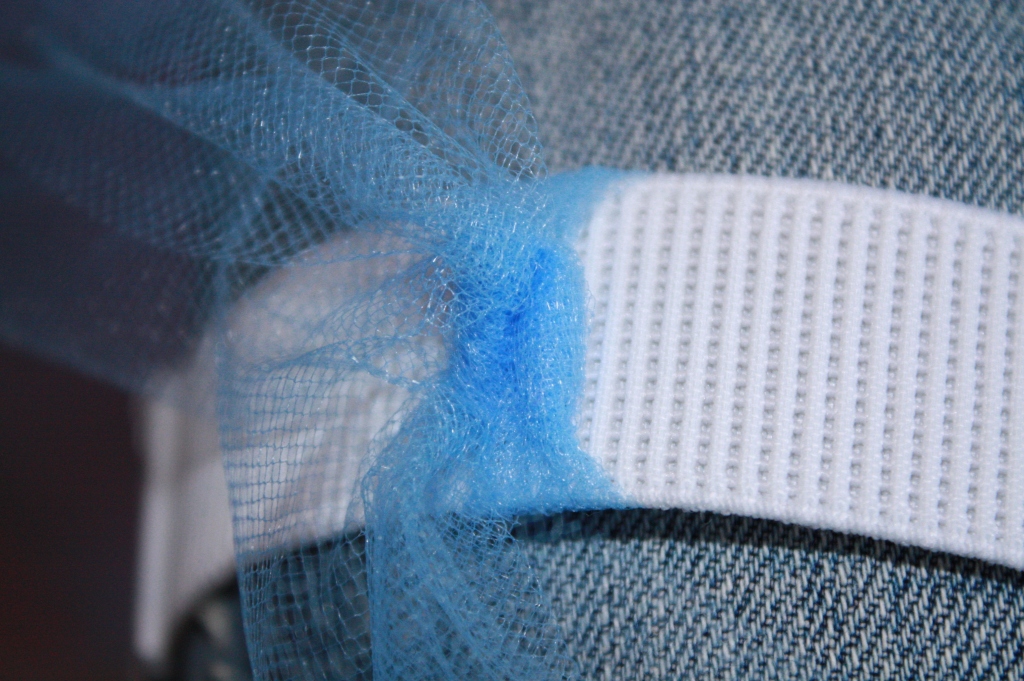 Close up of how to tie the tulle around the elastic waistband